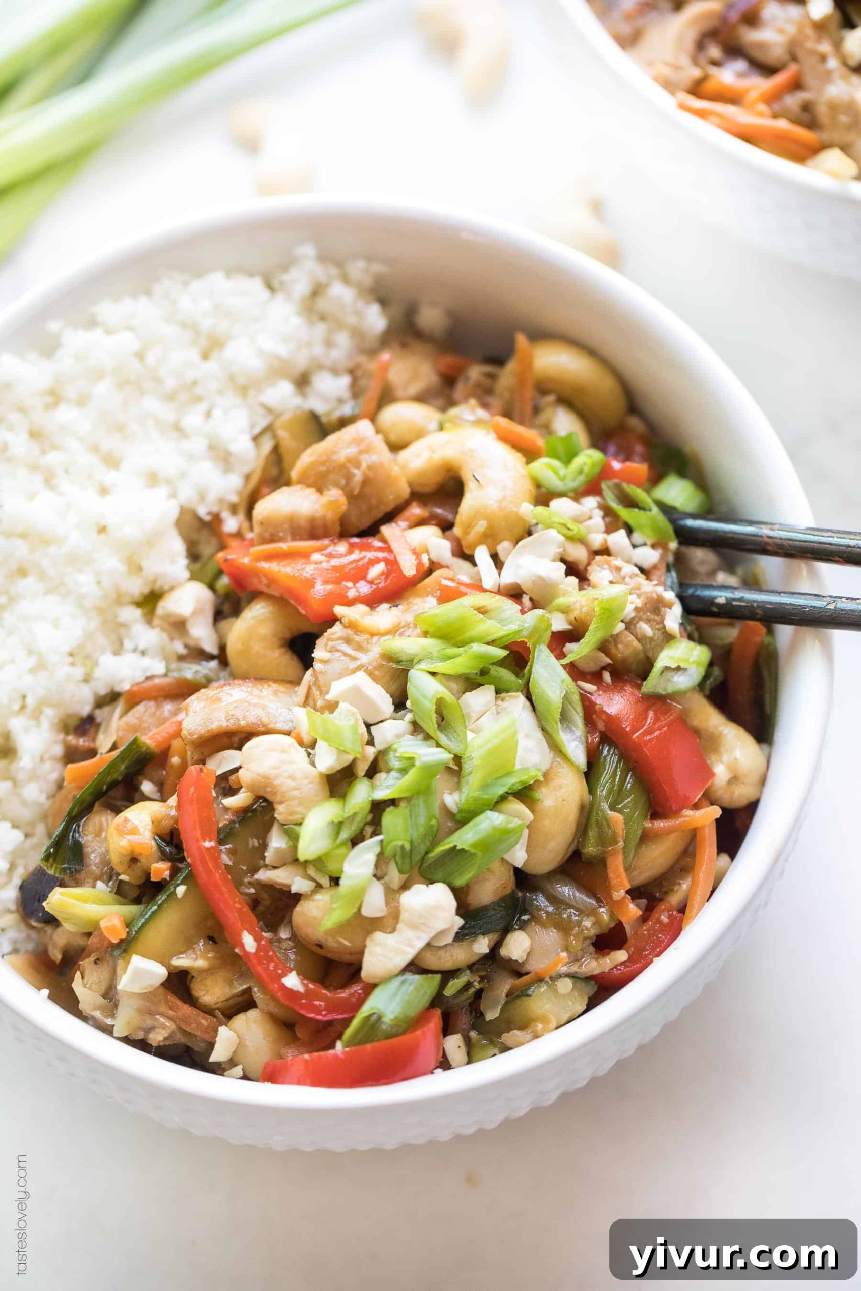 Chicken stir fry in a bowl with cauliflower rice