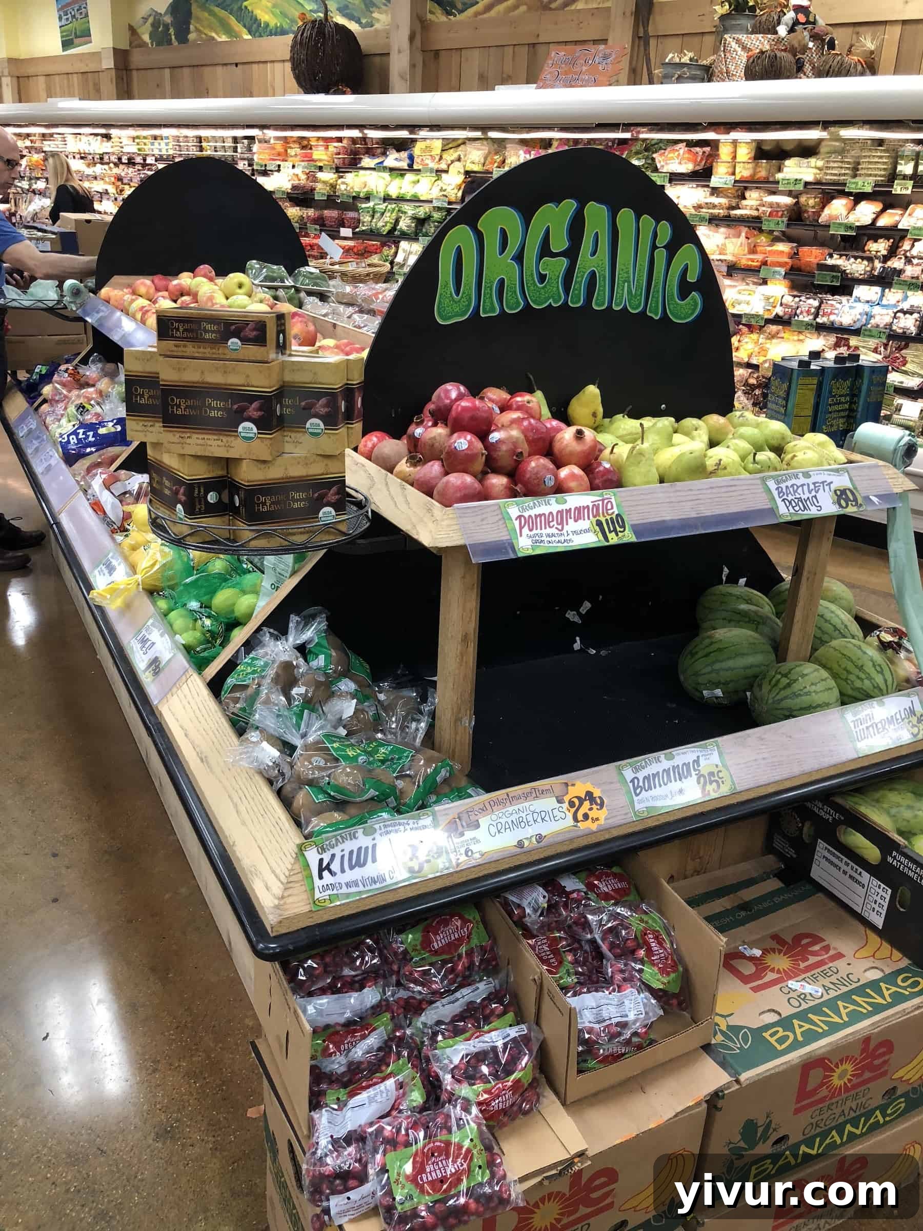 Selection of Whole30 compliant fresh produce at Trader Joe's including leafy greens and vibrant fruits