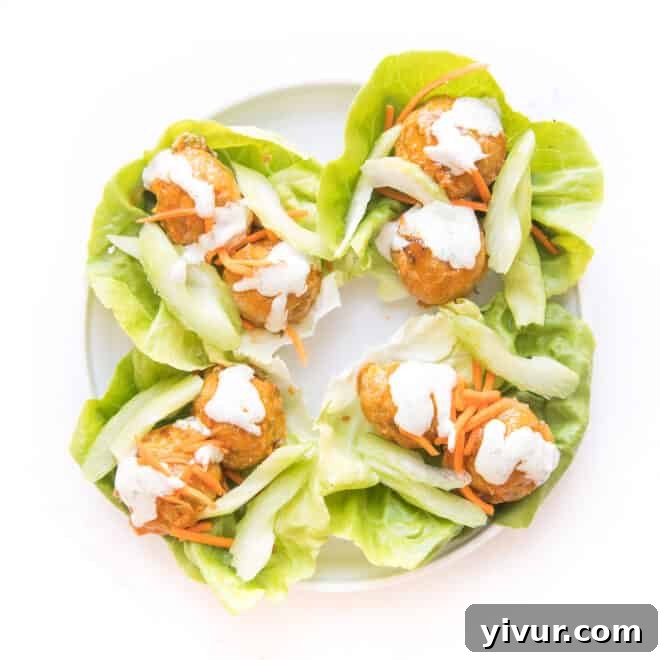 Keto buffalo turkey meatballs served on lettuce wraps with ranch dressing