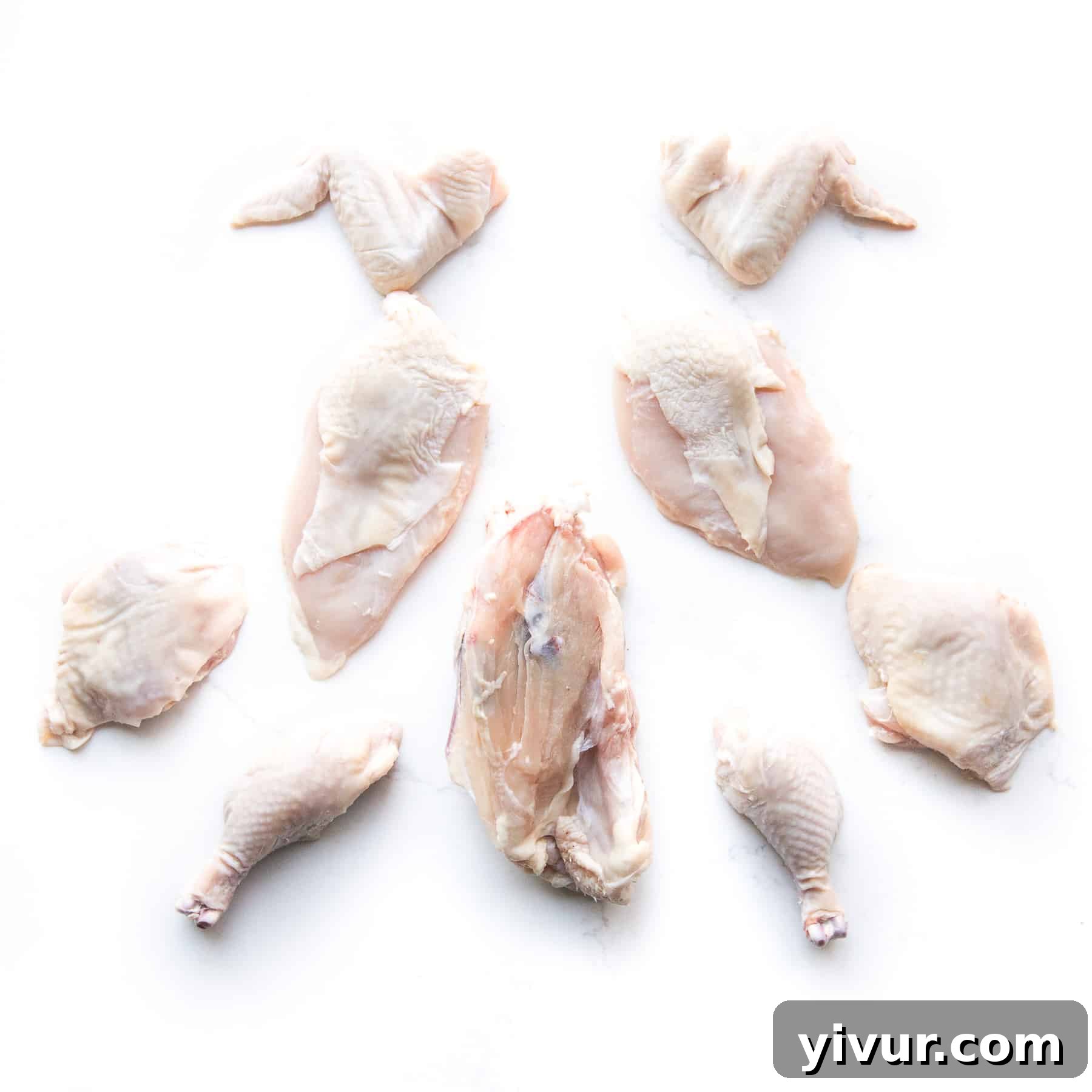 a whole chicken that has been cut down to 8 pieces