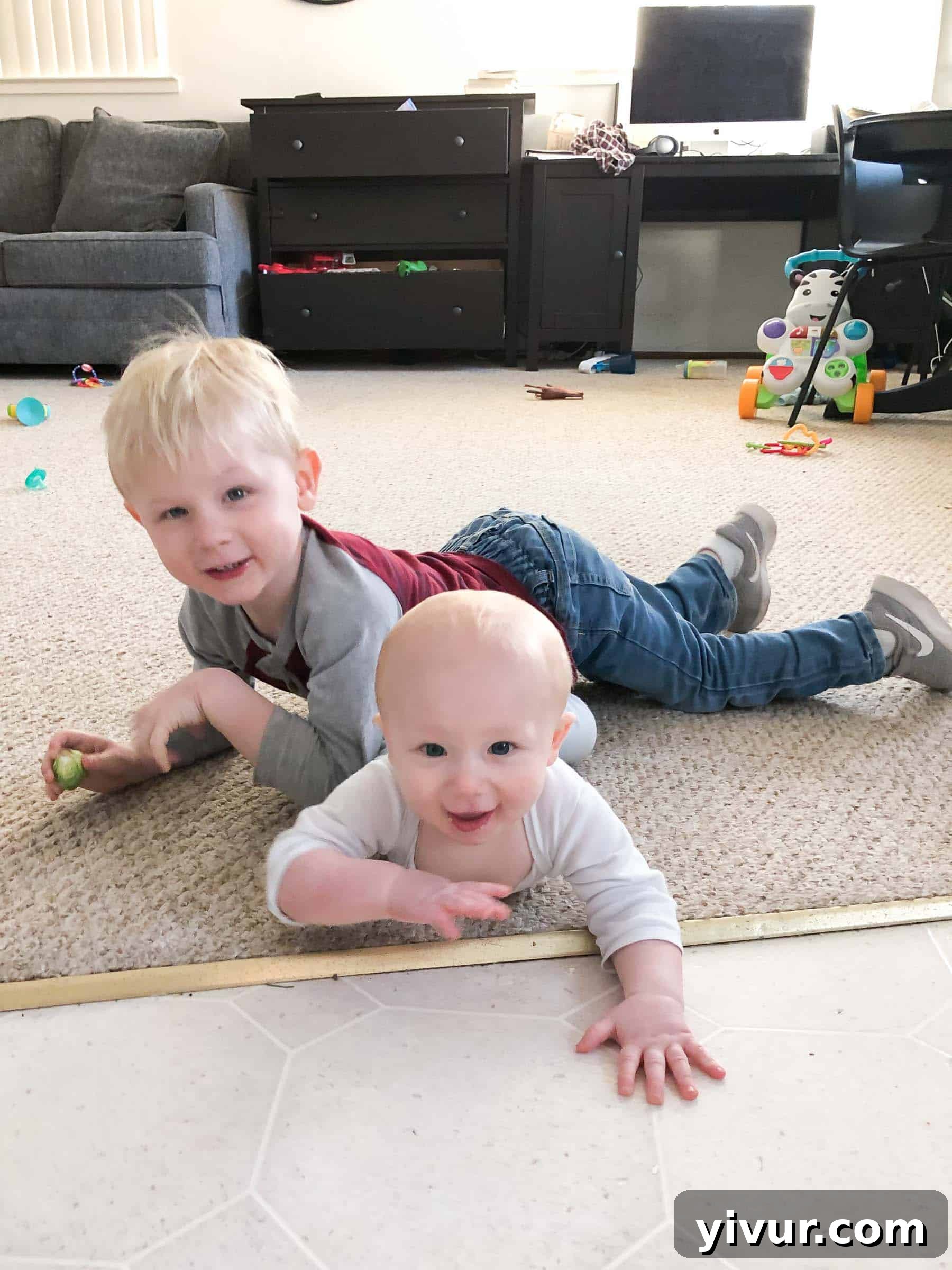 A tender moment of maternal care: Mom nursing baby Ryan in a serene, quiet area of the park, illustrating natural parenting and providing comfort during an outdoor family outing.