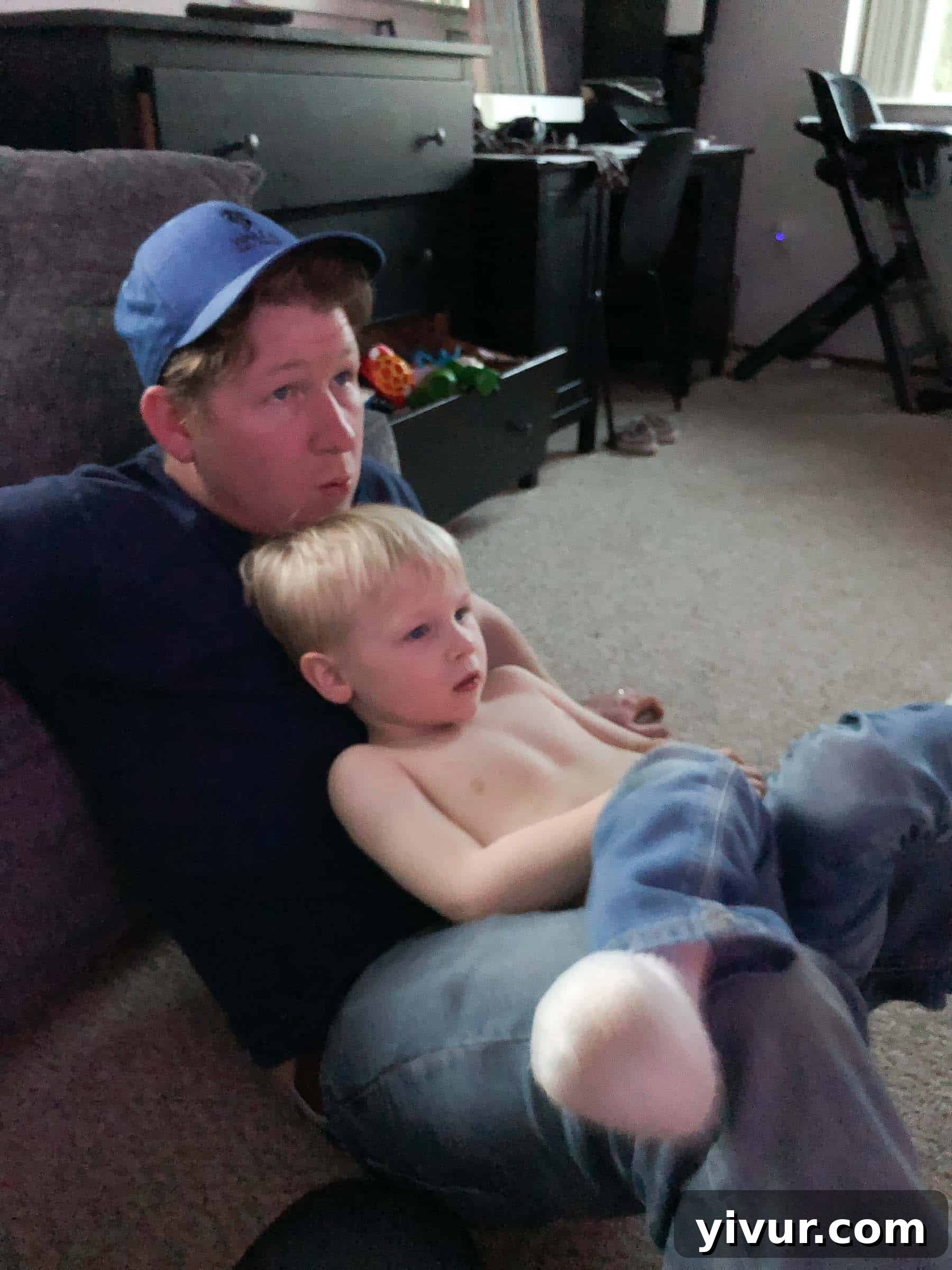 A tender bedtime moment: Mom cradling baby Ryan as he peacefully falls asleep while nursing, emphasizing the deep bond and comfort found in the evening routine.