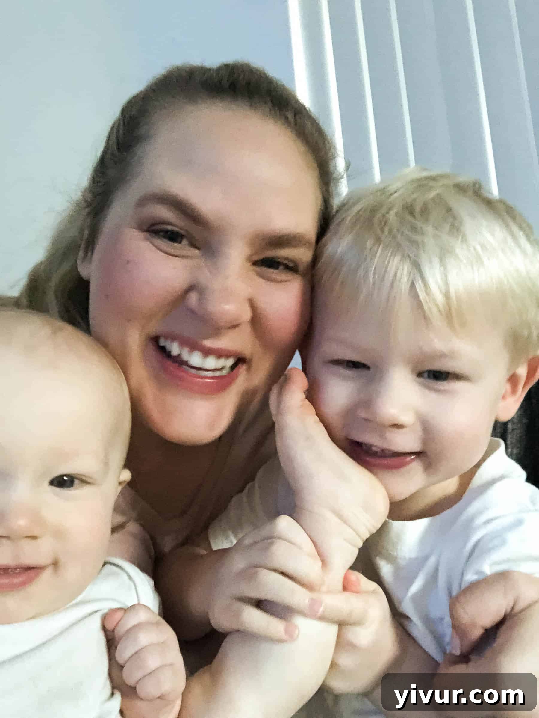 The joy of sibling connection: Josh and Ryan, full of morning energy, happily playing together in the living room. This photo captures the sweet, unfolding dynamics of brotherhood and family bonding.