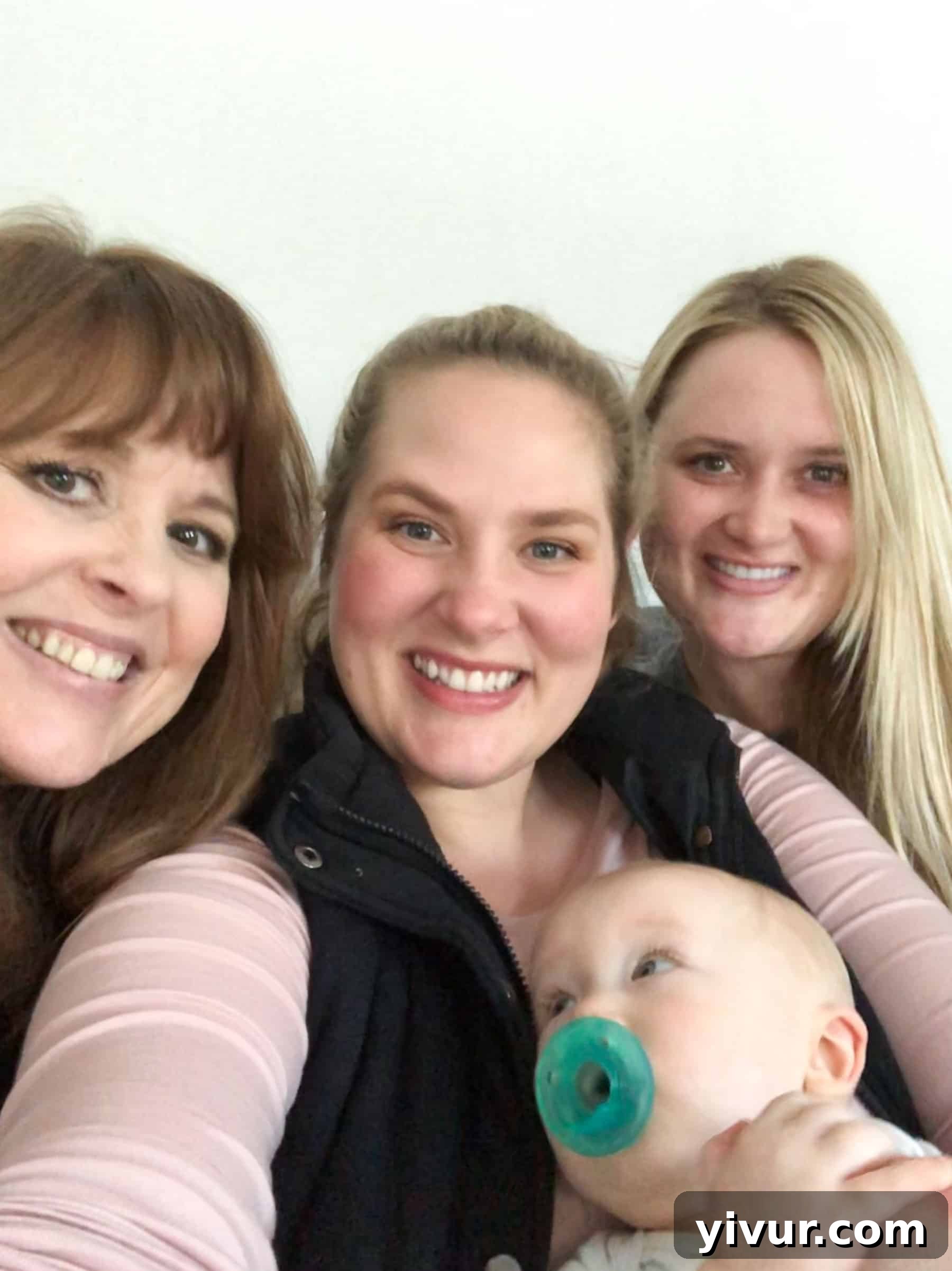 Three generations enjoying a cozy coffee date: Mom, sister, and grandmother sharing smiles and conversation on a comfortable couch, illustrating the warmth of family bonds and shared moments.