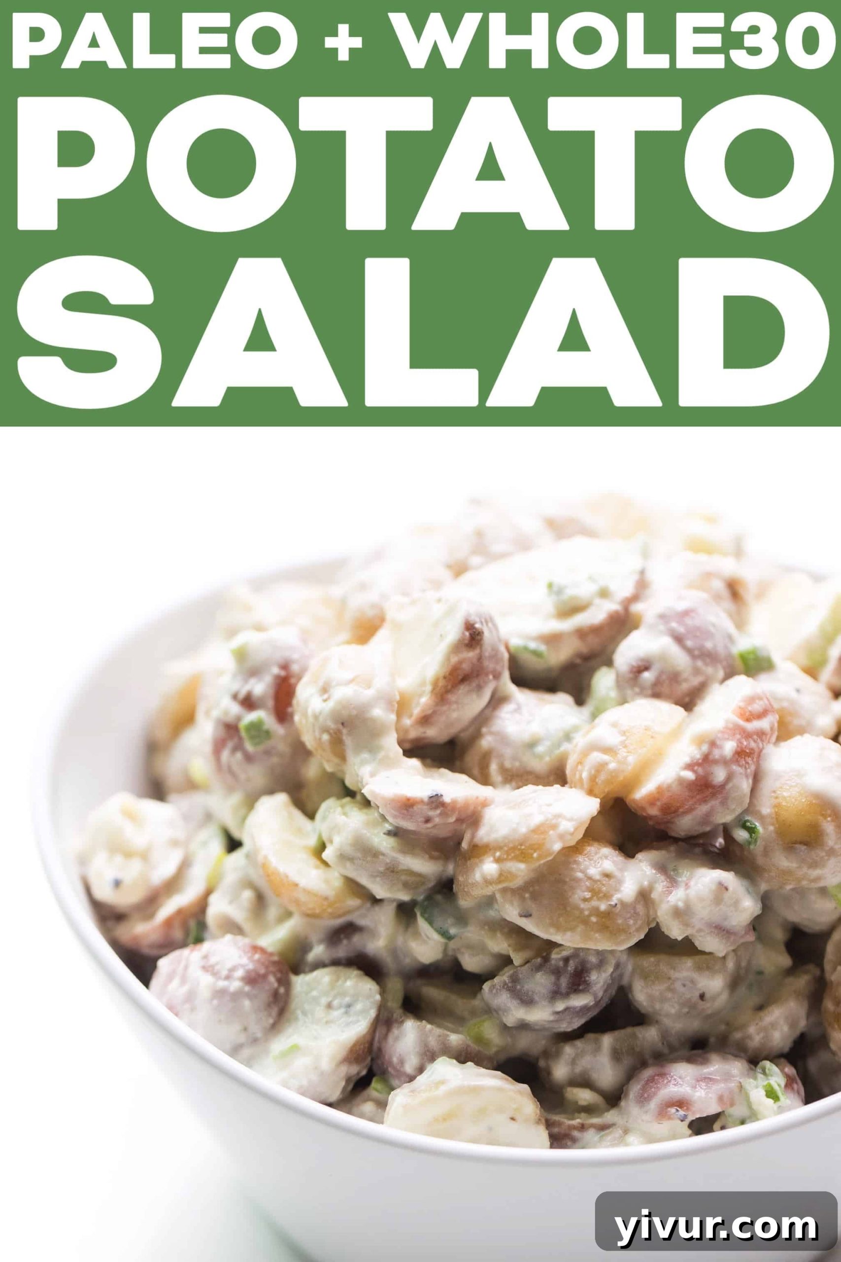 Two white bowls filled with creamy potato salad on a light wooden surface