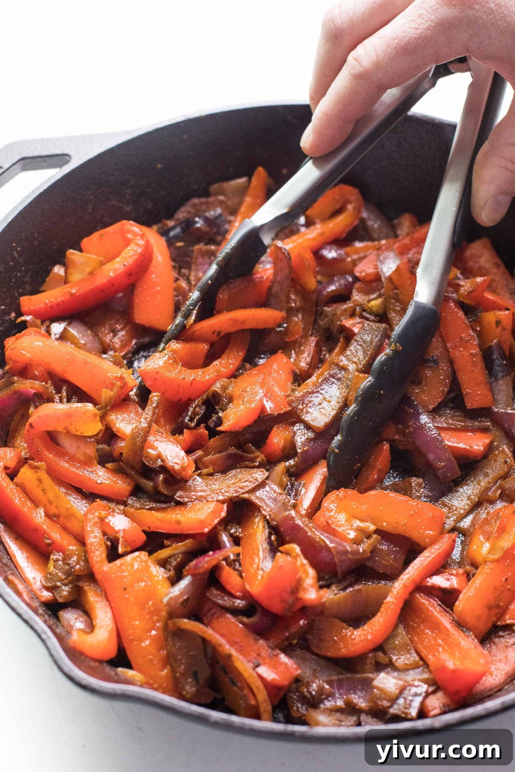Wholesome Fajita Veggies Whole30 Paleo Keto 2 Sizzling Whole30 fajita veggies in a cast iron skillet, brimming with colorful bell peppers and onions, ready to be a delicious addition to healthy Mexican meals.