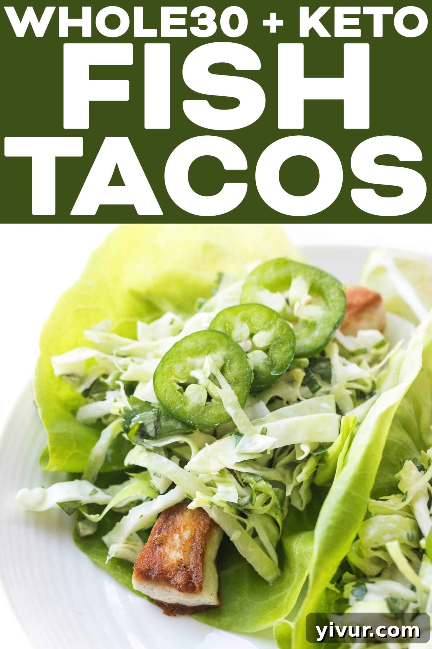 Whole30 Keto Fish Tacos with Fiery Slaw 7 A top-down view of two beautifully presented Whole30 Keto Fish Tacos on lettuce wraps, garnished with fresh cilantro and lime.