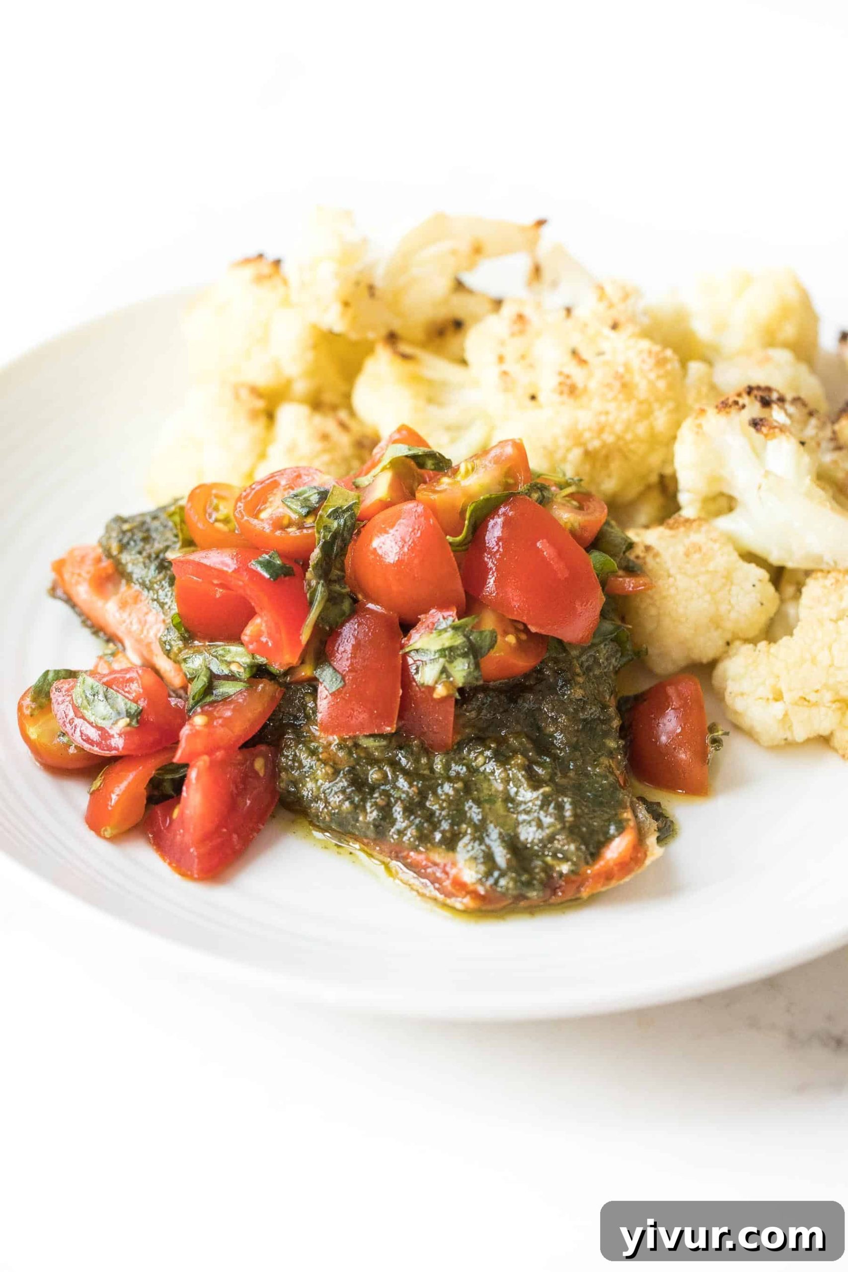 Caprese Pesto Salmon for Whole30 and Keto 6 Close-up of a completed Whole30 Keto Caprese Pesto Salmon dish, ready to be enjoyed