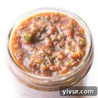 A vibrant close-up of homemade Whole30 + Keto Salsa, showcasing its fresh ingredients and inviting texture, ready to be served.