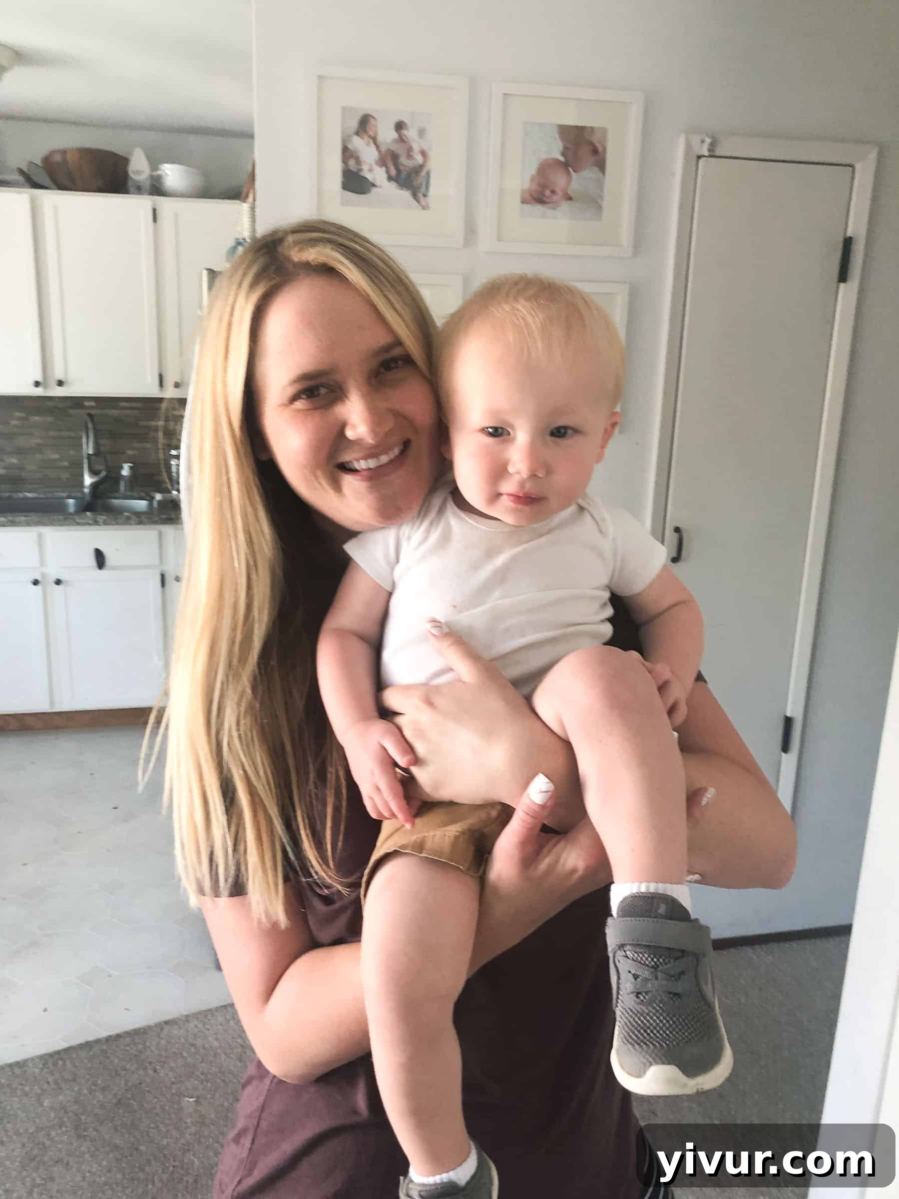 A Glimpse into Summer 2019 10 A mother cuddling with her two young sons, Josh and Ryan, on a bed.