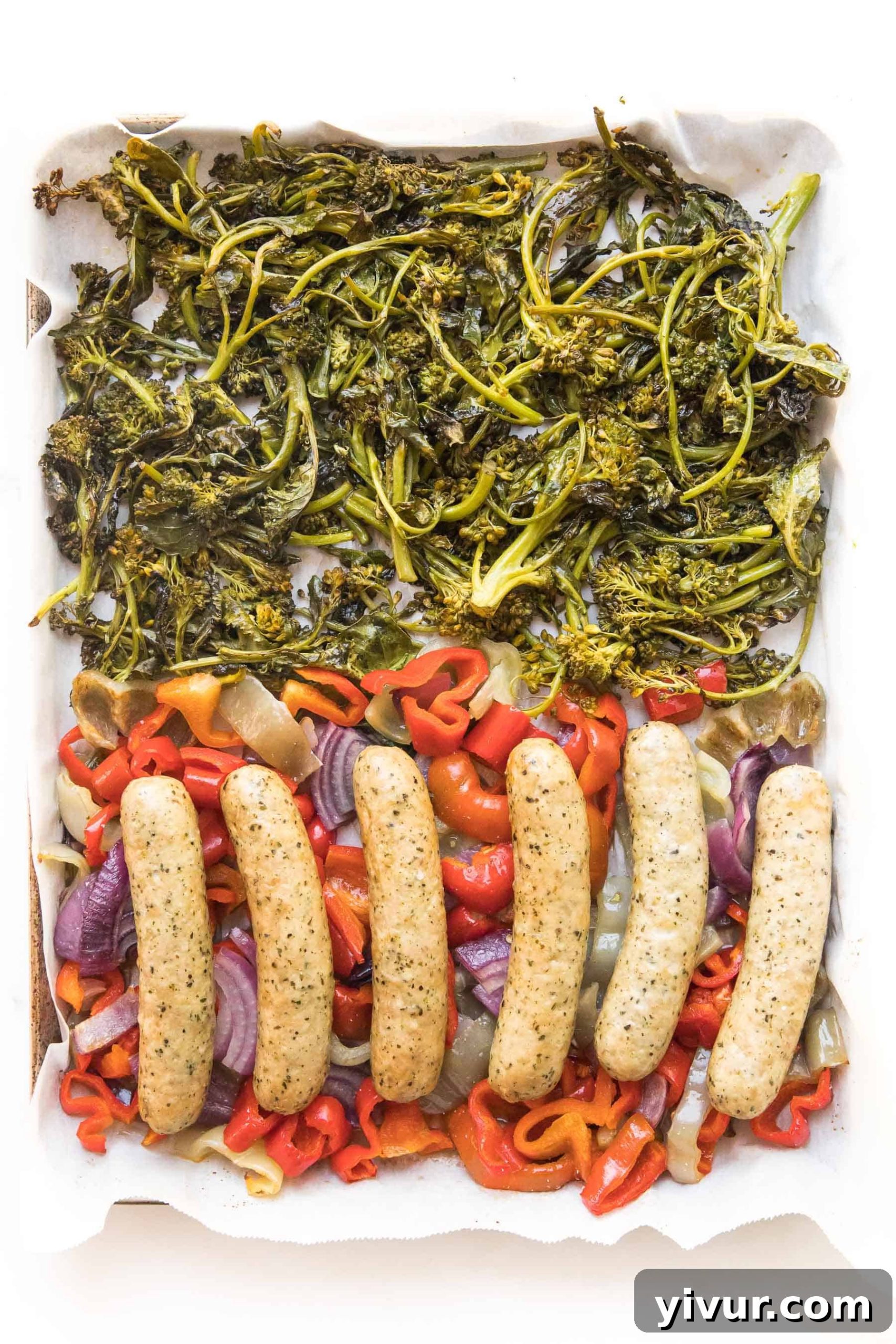 sausages and veggies on a sheet pan