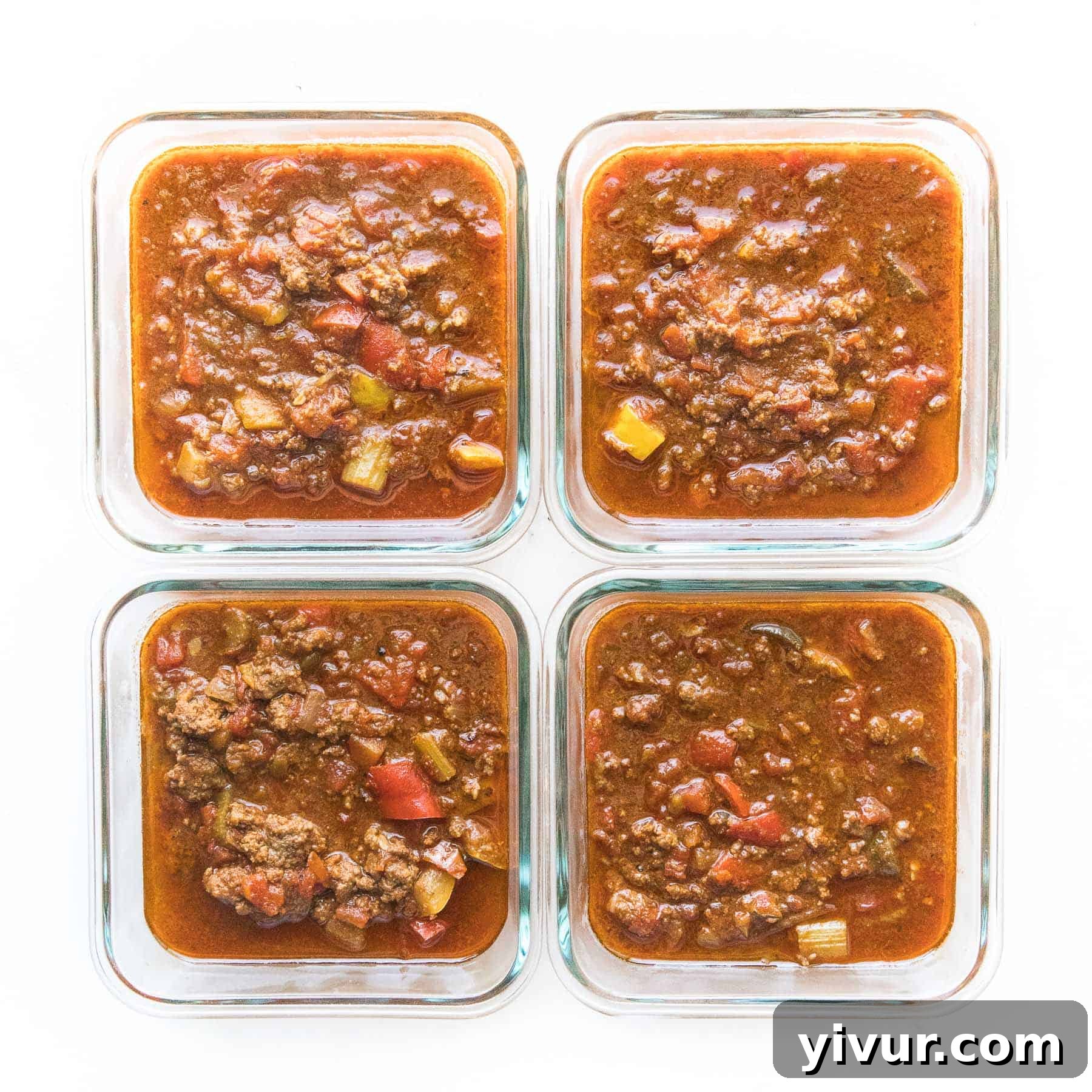 Keto Whole30 Instant Pot Chili Beanless and Easy 9 Organized meal prep containers filled with freshly made Keto Instant Pot Chili, ready for storage and future enjoyment, highlighting the recipe's convenience for batch cooking.