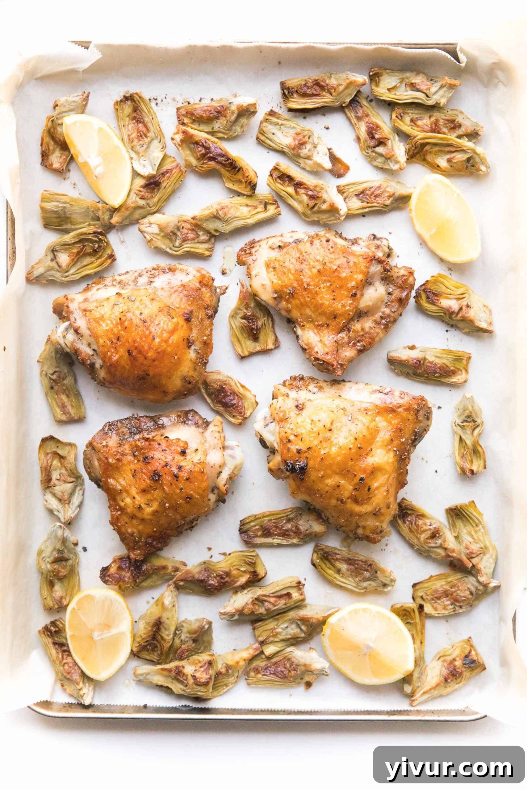 Roasted chicken and artichokes on a sheet pan