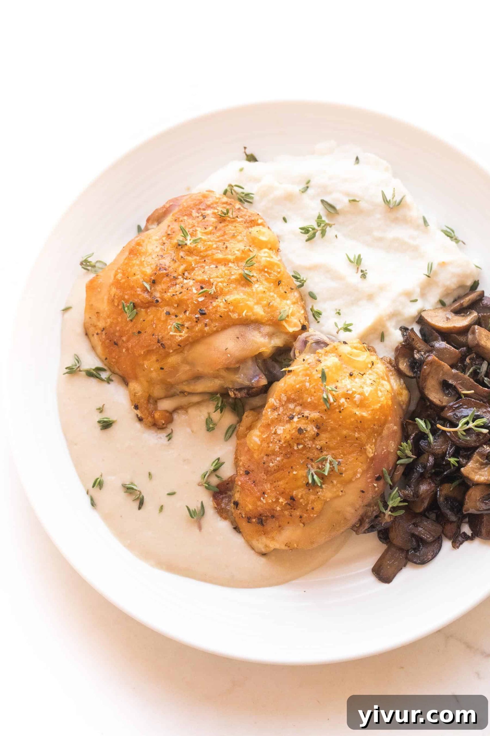 Whole30 Keto Luscious Creamy Mustard Chicken Thighs 2 Crispy chicken thighs with mashed cauliflower + sauteed mushrooms with mustard sauce