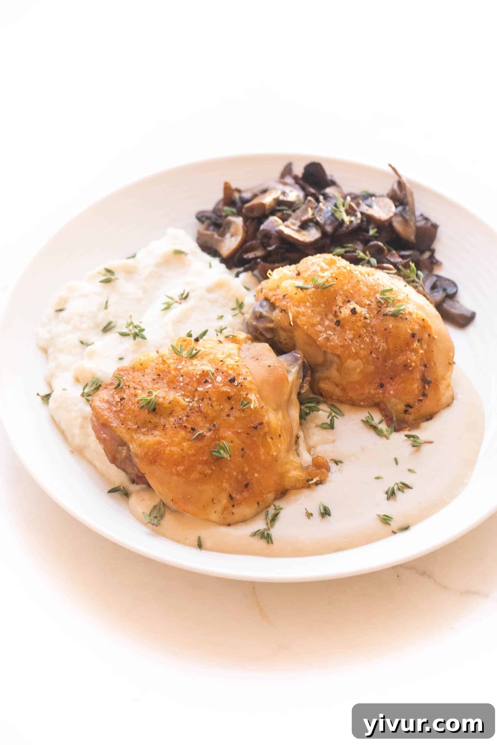Whole30 Keto Luscious Creamy Mustard Chicken Thighs 4 Crispy chicken thighs with mashed cauliflower + sauteed mushrooms with mustard sauce