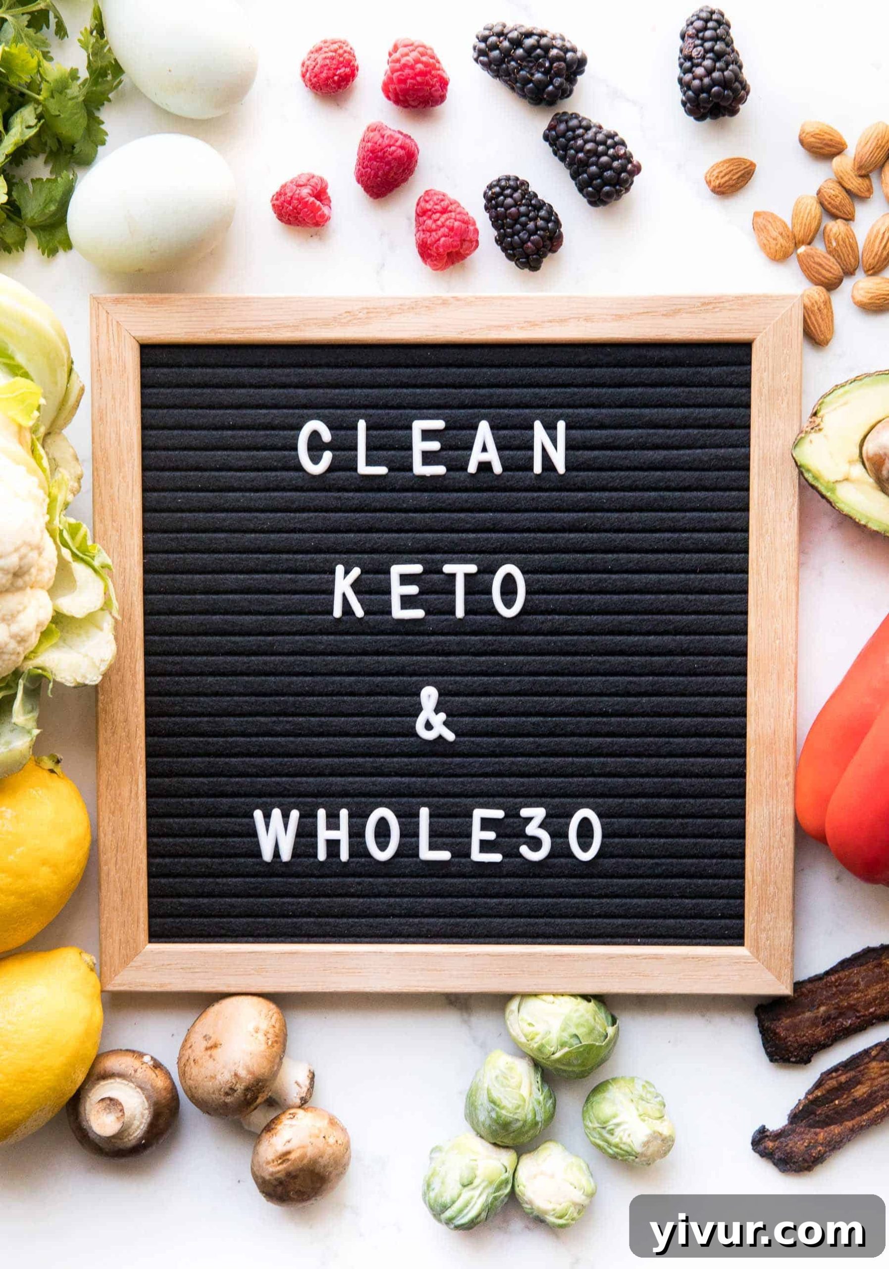 A vibrant plate of clean keto and whole30 compliant foods, showcasing fresh vegetables, healthy fats, and lean protein, ready for a delicious meal.