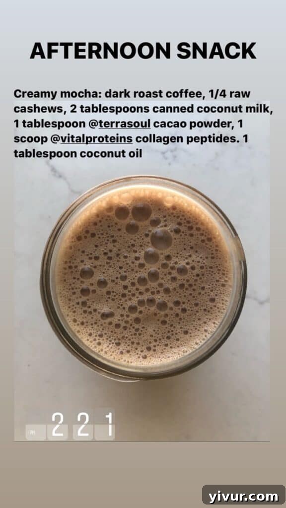 A comforting mug of Creamy Cashew Coffee with cacao powder, a delightful and energizing keto-friendly beverage.