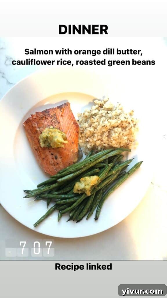 Delicious Salmon with Orange Dill Butter, served with cauliflower rice and roasted green beans for a light and flavorful Whole30 and keto dinner.