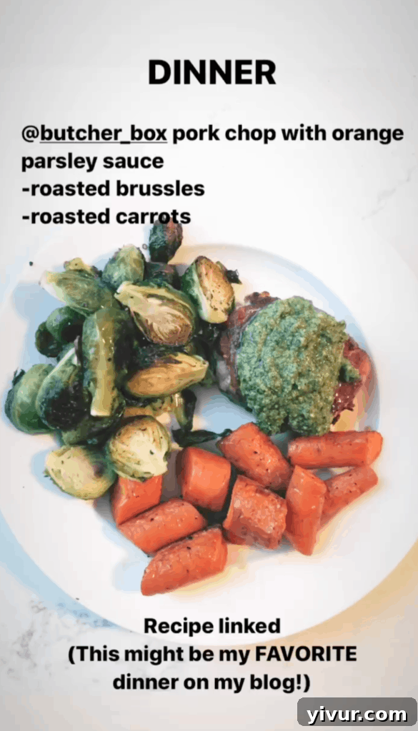 Flavorful Pork Chops with Orange Parsley Sauce, served with roasted carrots and Brussels sprouts, a delightful Whole30 and keto dish.
