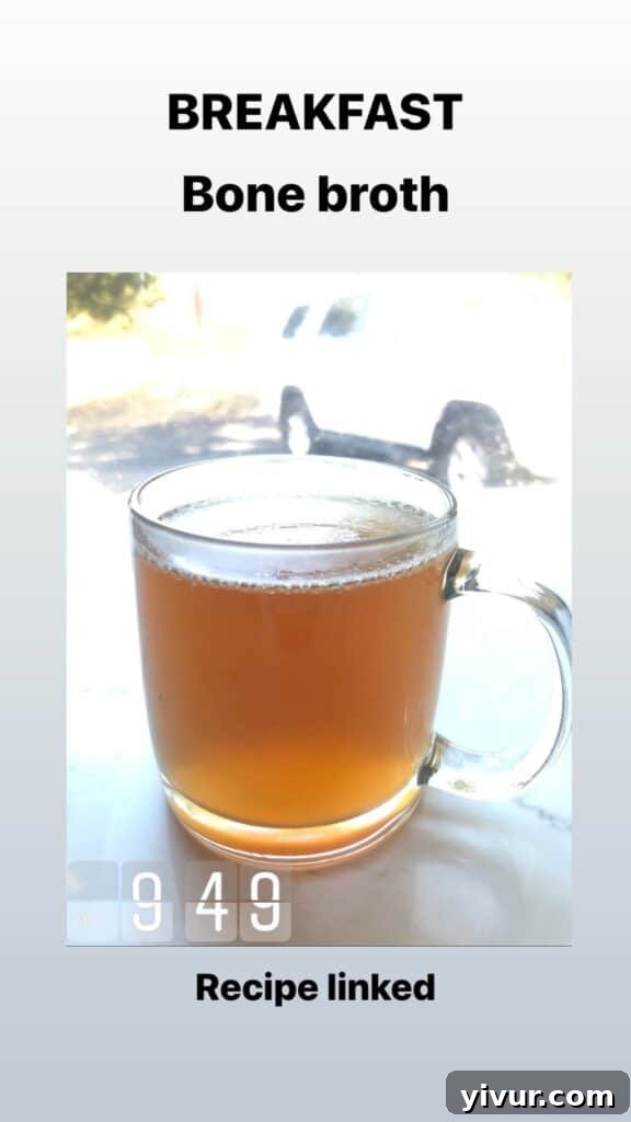 A warm mug of bone broth, a nutrient-dense and soothing drink essential for gut health and overall wellness on Whole30 and keto.