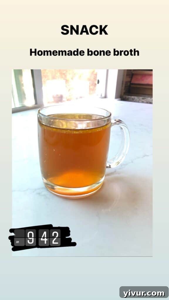 A comforting mug of bone broth, a warm and beneficial drink for clean eating.