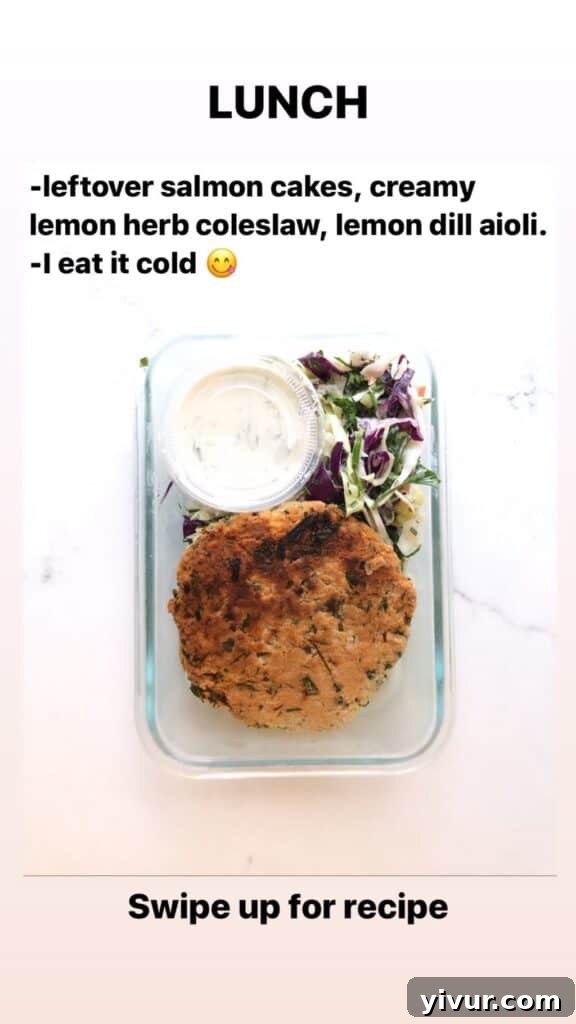 A hearty and compliant clean keto meal featuring crispy salmon cakes and a side of fresh herby lemon coleslaw.