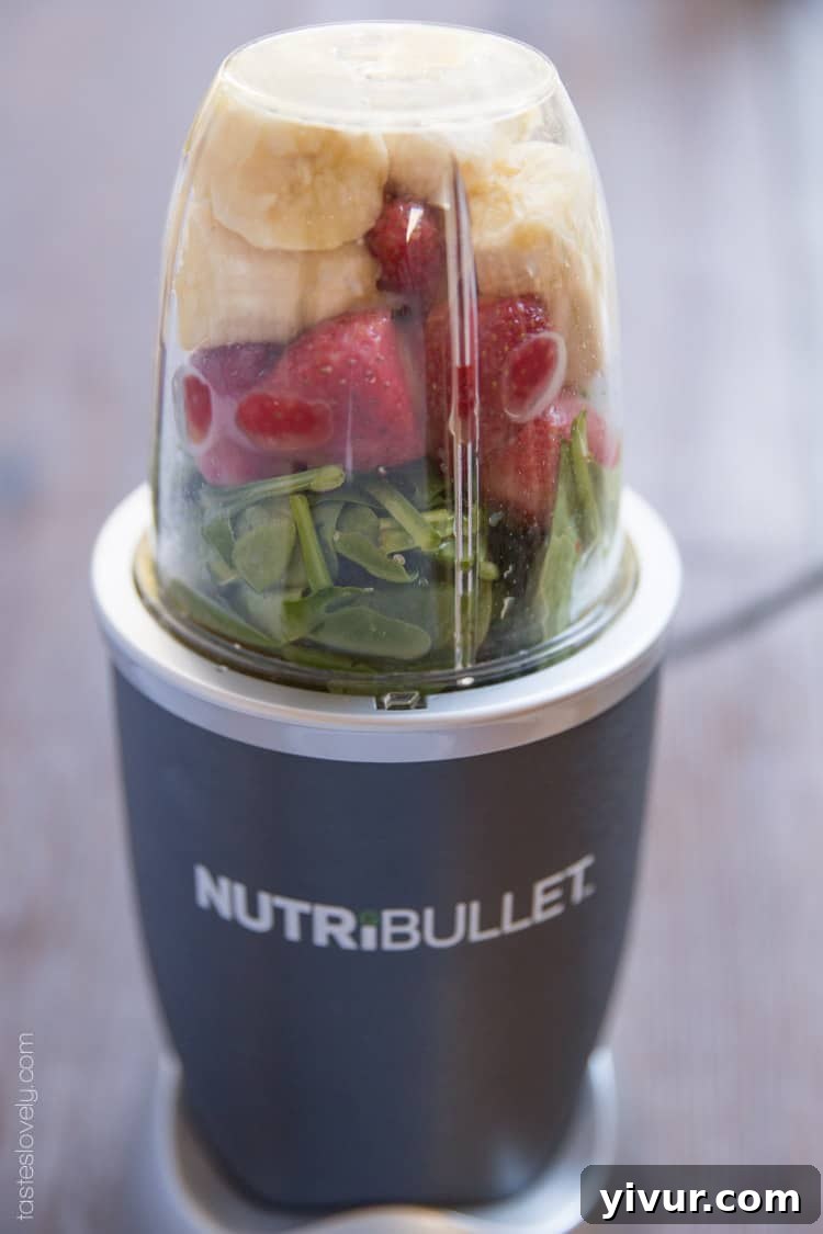 Ingredients for a Strawberry & Banana Green Smoothie before blending