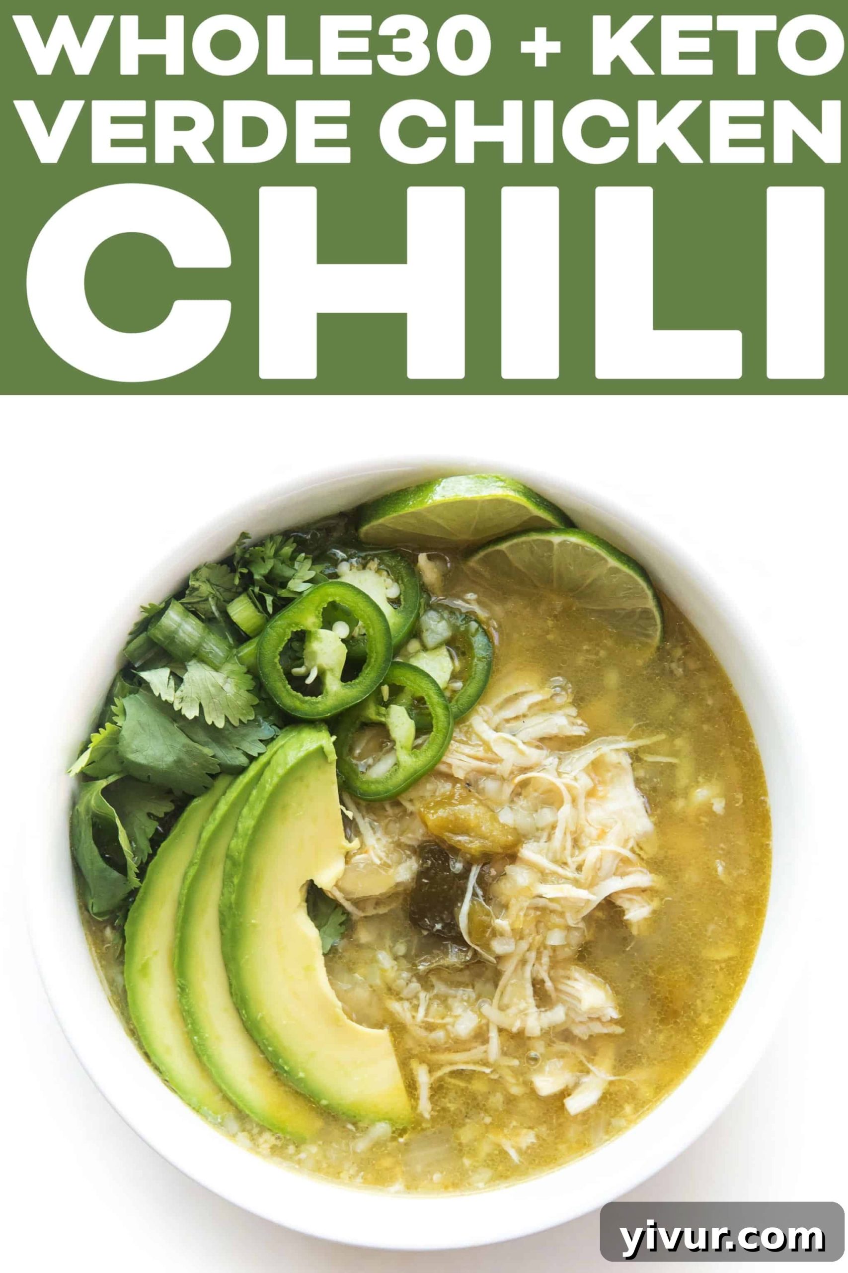 Effortless Whole30 Keto Instant Pot Verde Chicken Chili 7 A vibrant green Verde Chicken Chili, garnished with fresh avocado slices and cilantro, in a white bowl, against a light background. This appealing dish is ideal for healthy, low-carb, and Whole30 lifestyles.