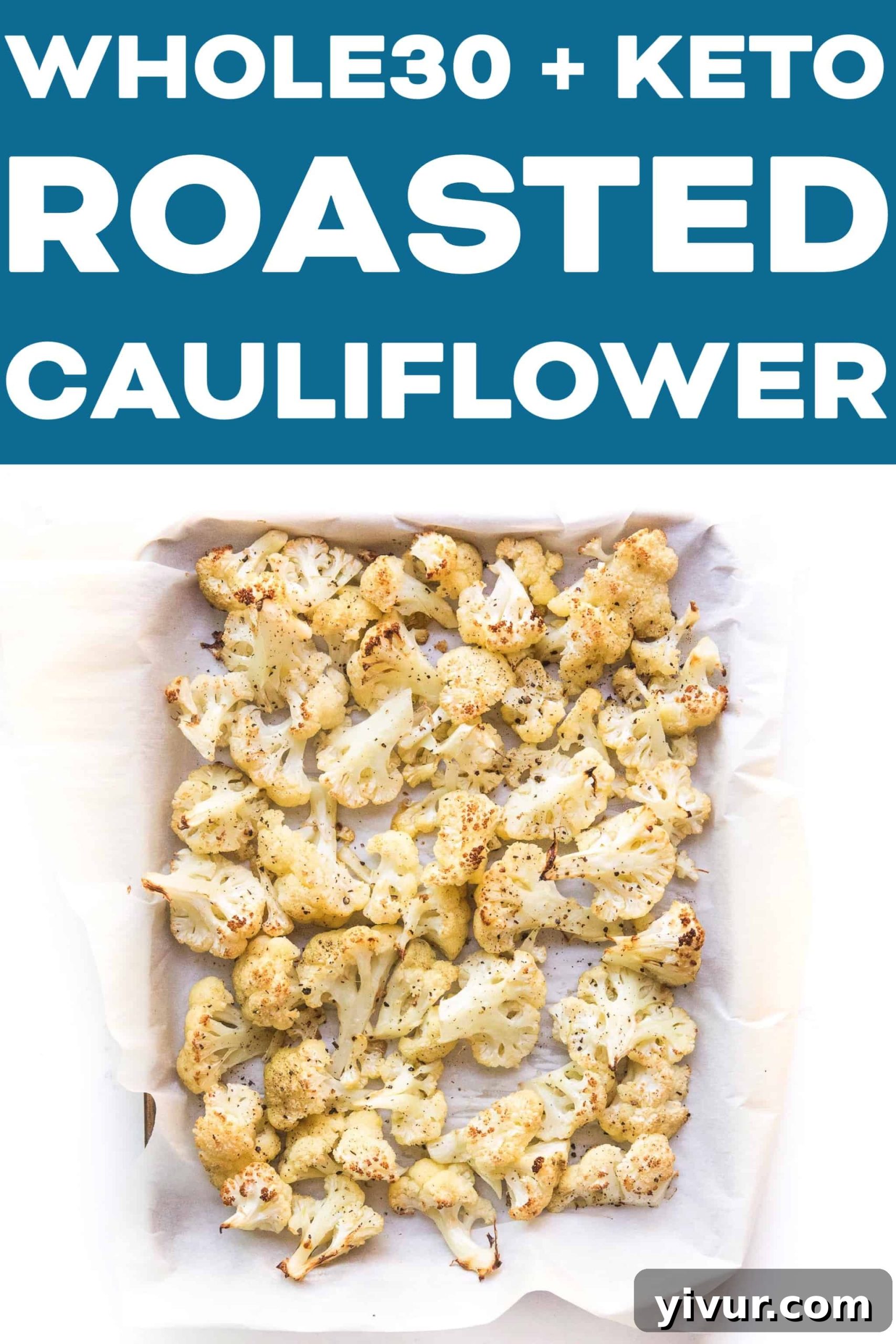 A spread of roasted cauliflower on a serving plate, garnished with fresh herbs.